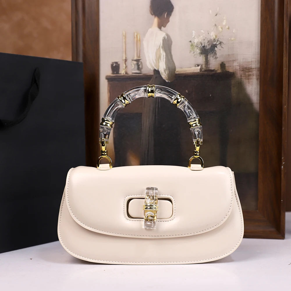 The 2025 new bamboo joint hand-held saddle bag is a versatile and high-end small single-shoulder crossbody bag for women
